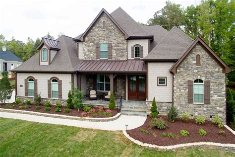 metal and brick house|exterior brick metal roof.